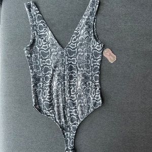 Suzette NWT Black and White Snake Print Bodysuit